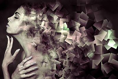 Stylised side profile of a woman's face fading into cubes - Image by Stefan Keller from Pixabay