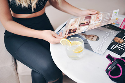 woman looking at beauty magazines - Photo by ŞULE MAKAROĞLU on Unsplash