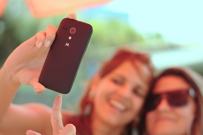 Two Millednnial women posing for a selfie