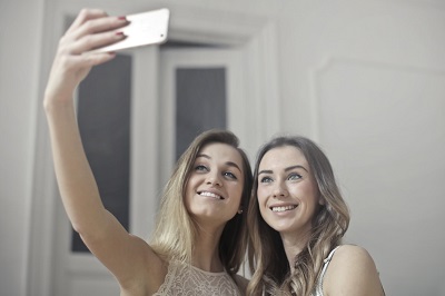 Two girls taking a selfie together