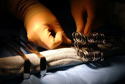 Surgeon with surgical instruments